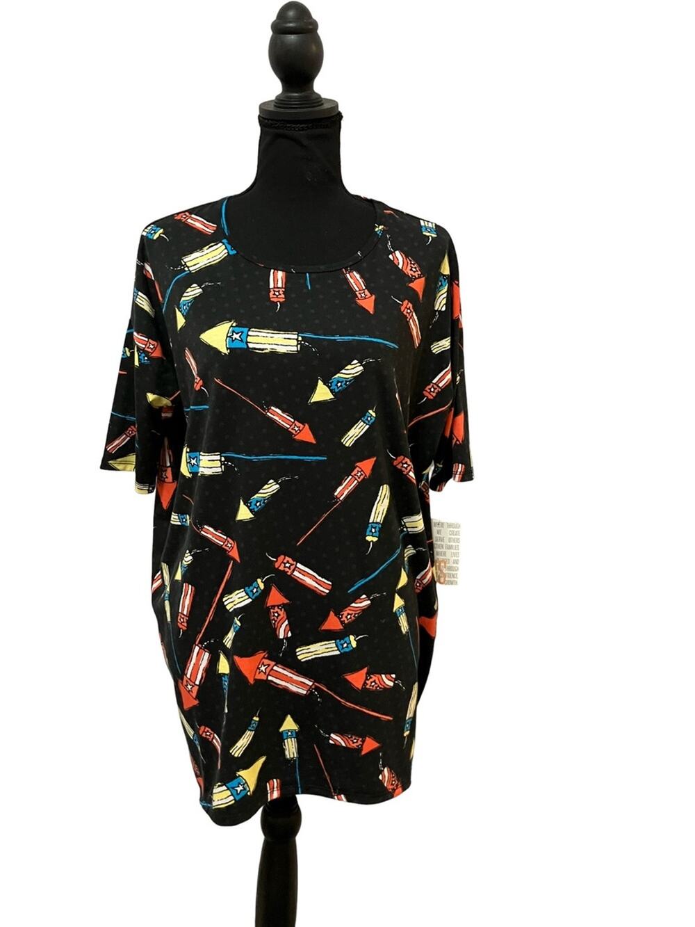 LuLaRoe Irma tunic features a patriotic firework and rocket print NWT XS